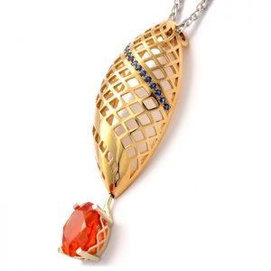 9ct yellow and white gold pendant with zincite and sapphire