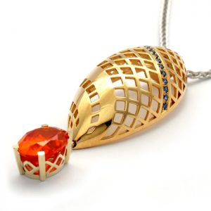 9ct yellow and white gold pendant with zincite and sapphire