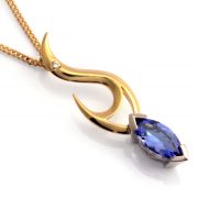 18ct yellow and white gold pendant with marquise tanzanite and diamond