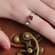 silver ring with garnet and blue diamonds