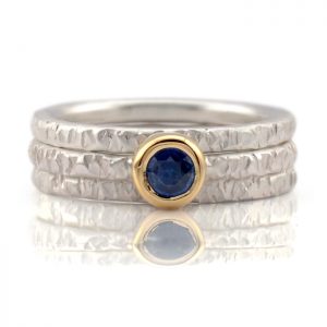hammer textured 3 ring set with blue sapphire