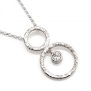 sterling silver pendant with circles and white cz