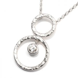 sterling silver pendant with circles and white cz
