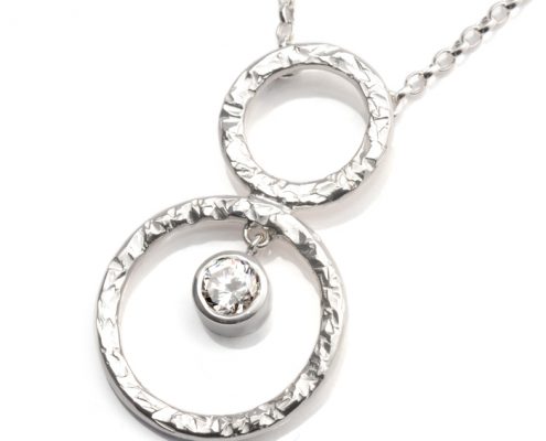sterling silver pendant with circles and white cz