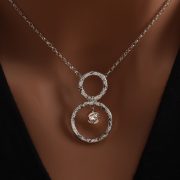 sterling silver pendant with circles and white cz