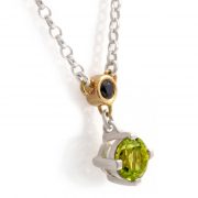 sterling silver and 18ct gold pendant with peridot and black sapphire