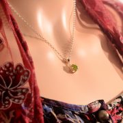 sterling silver and 18ct gold pendant with peridot and black sapphire