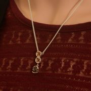 sterling silver circle pendant with garnet